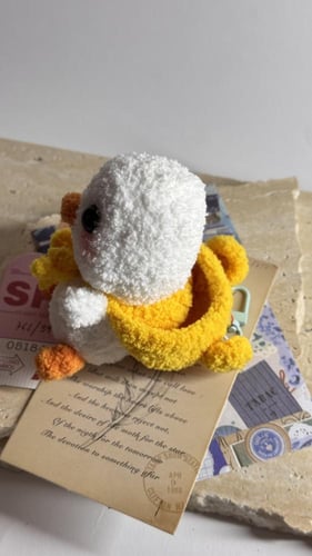 تعليقة صوف على شكل بطوط