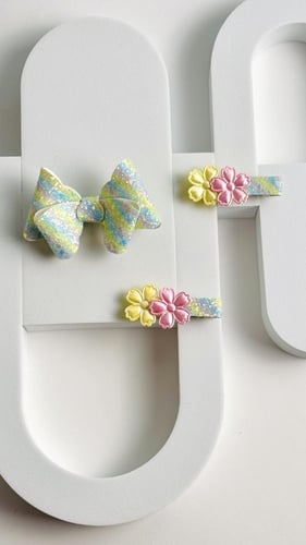 توكات جلد لامع مزينة بالورد