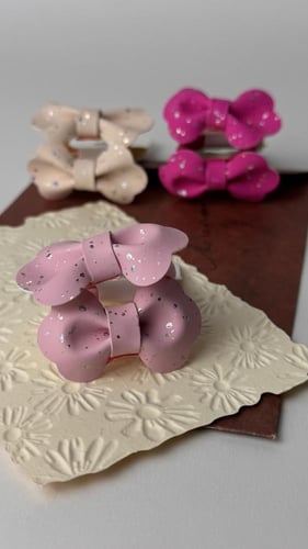 بكلات جلد لون فوشي