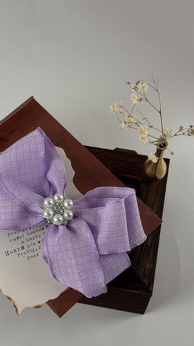 توكة شرايط بنفسجي مزينة بفص لولو وكرستال