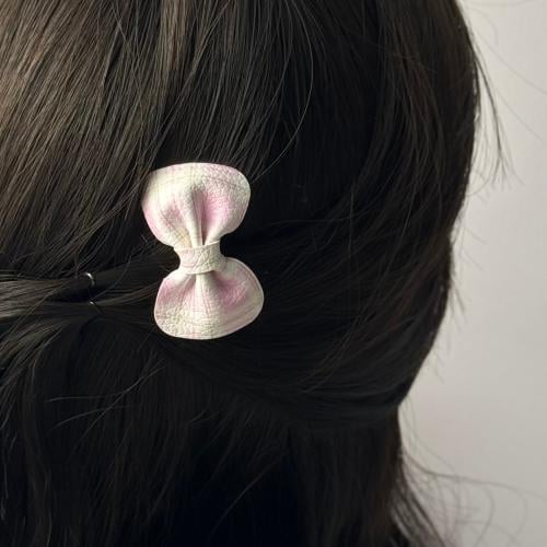 توكات جلد أبيض بكاروهات وردي