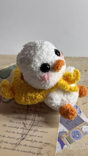 تعليقة صوف على شكل بطوط