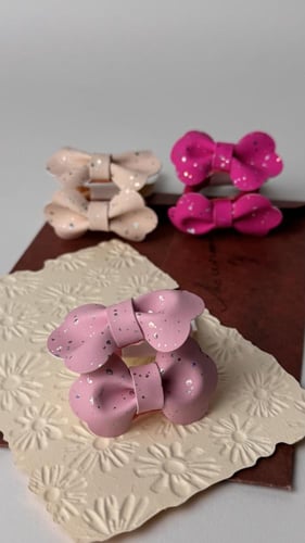 بكلات جلد لون فوشي