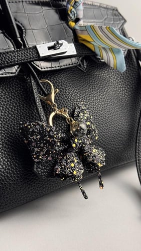 تعليقة شنطة على شكل فراشة