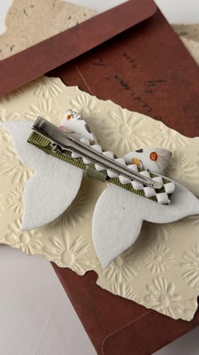 توكة جلد زيتي وجلد أبيض مشجر