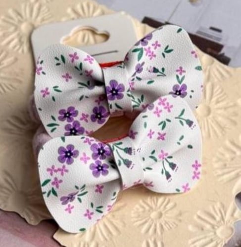 بكلات جلد أبيض برسومات أزهار