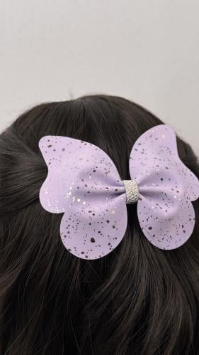 فراشة كبيرة جلد بنفسجي مزينة بنقط فضي