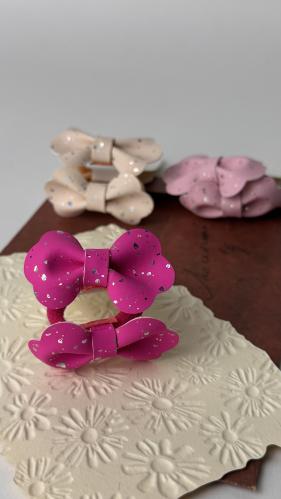 بكلات جلد لون فوشي