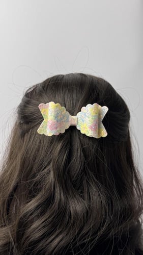 توكة جلد بأطراف أقواس