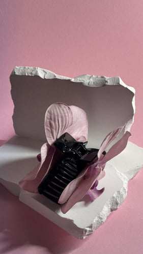 مساكة شعر زهرة الأوركيد وردي