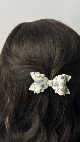 توكات جلد لامع مشجر برسومات باللون الازرق