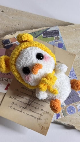 تعليقة صوف على شكل بطوط