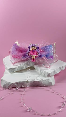 توكة شيفون وتول مزينة بمجسم دمية