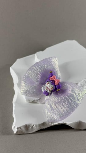 توكة فيونكة قماش لامع بنفسجي بشخصية كورمي