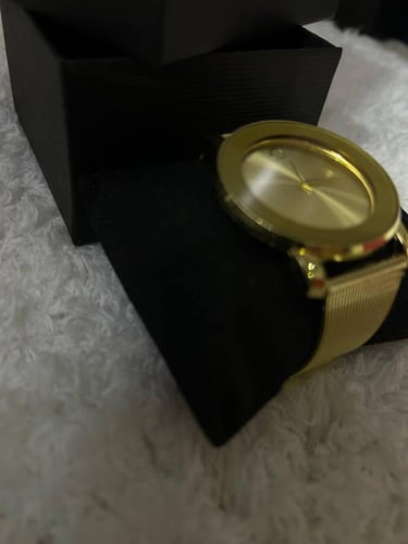 ساعة كلاسيكية بسوار معدني ذهبي - فضي -اسود