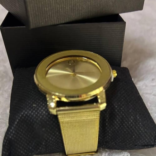 ساعة كلاسيكية بسوار معدني ذهبي - فضي -اسود