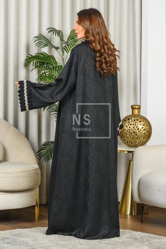 عباية جاكار مشجَر مع التخريم المموج وكلفة الشك في...