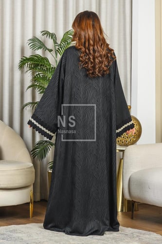 عباية جاكار مشجَر مع التخريم المموج وكلفة الشك في...