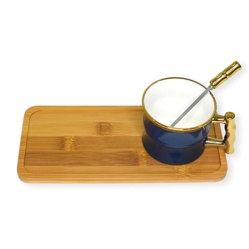 كوب مع قاعده خشبية محفور عليه عبارات