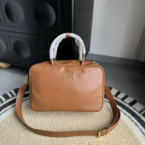 شنطة miumiu المستطيلة بني جملي