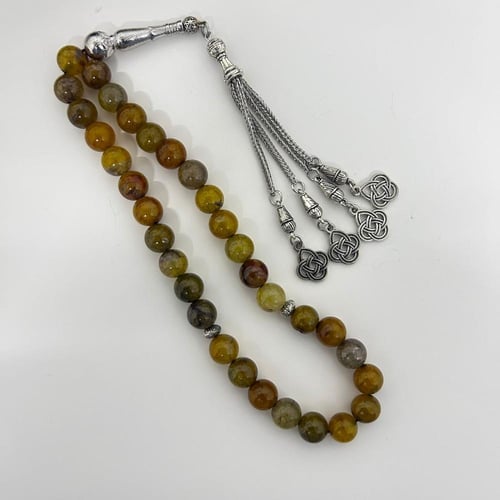 سبحة العقيق البرازيلي شبيه الكهرمان