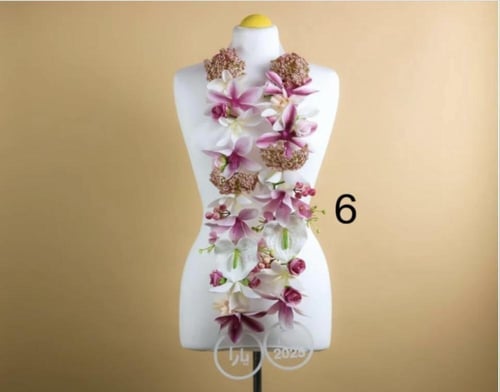 عقد زهرة تخرج بالاسم