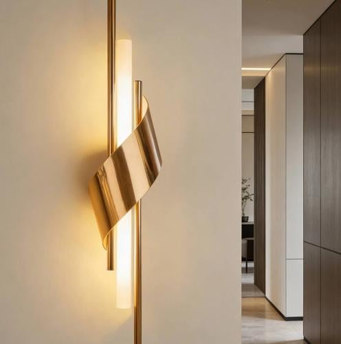 Modern gold finish applique with 3 lighting points...