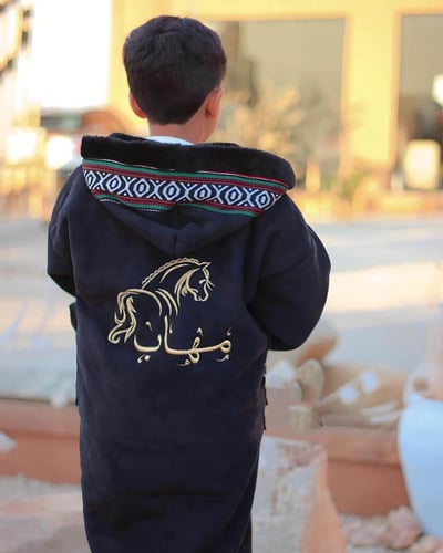فروه ولادي شتوي اسود بالاسم
