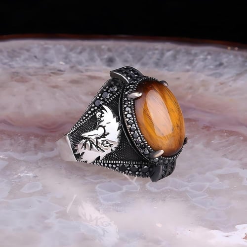خاتم فضة راقي مرصع بحجر عقيق عين النمر و رأس الصقر...