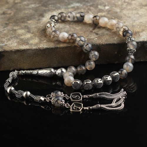 سبحة راقية من أحجار العقيق الطبيعي وبشرابة وخرز من...