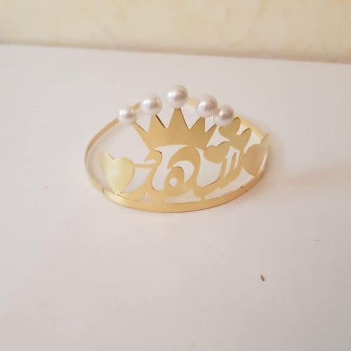 تاج اطفال بالاسم مطلي بالذهب