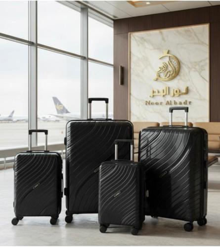 طقم شنط سفر مكون من 4 قطع ضد الكسل 4