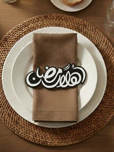 A phrase introducing a table, Welcome Ramadan, with elegant Islamic design – stylish Ramadan decor for the table