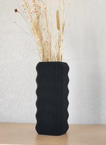 مزهرية مموجة عصرية – لمسة أناقة بسيطة لكل زاوية