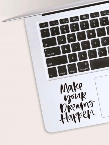 ملصق بعبارة make your dreams happy