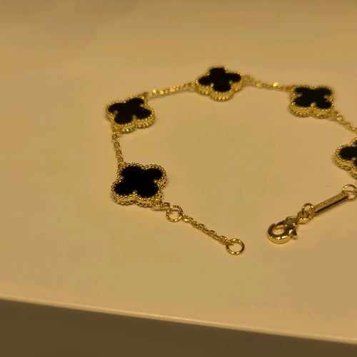 اسوره الزهرة لون اسود مطليه ذهب