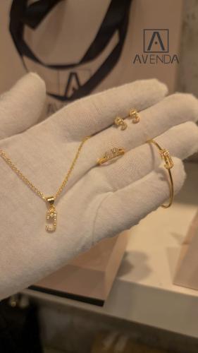 طقم اطفال مطلي ذهب