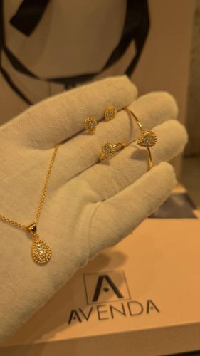 طقم اطفال مطلي ذهب