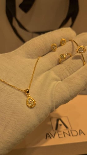 طقم اطفال مطلي ذهب