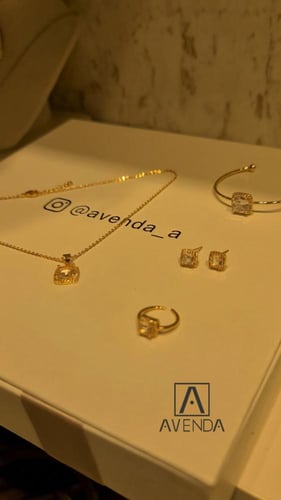 طقم اطفال مطلي ذهب