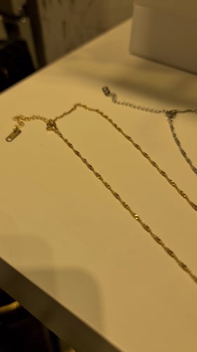 سلسال ناعم مطلي