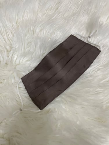 كمام مدرج بني بمثبت انف