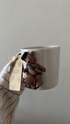 كوب تخرج دبدوب رمادي