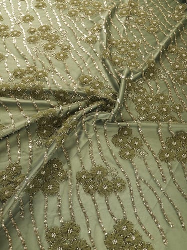 تل مطرز مشغو شك (بقصات التول البارز )