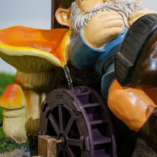 نافورة علي شكل كرتوني و قاعدة من الصخور مقاس 66x36...