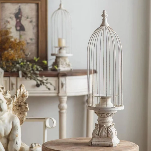 شمعدان بتصميم قفص حديد