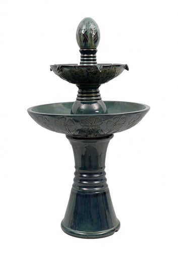 نافورة مياة بمستويين لتدفق المياه باللون الاخضر ال...