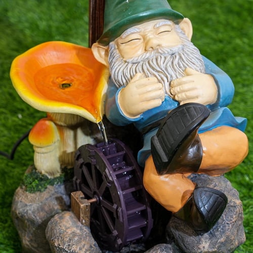 نافورة علي شكل كرتوني و قاعدة من الصخور مقاس 66x36...