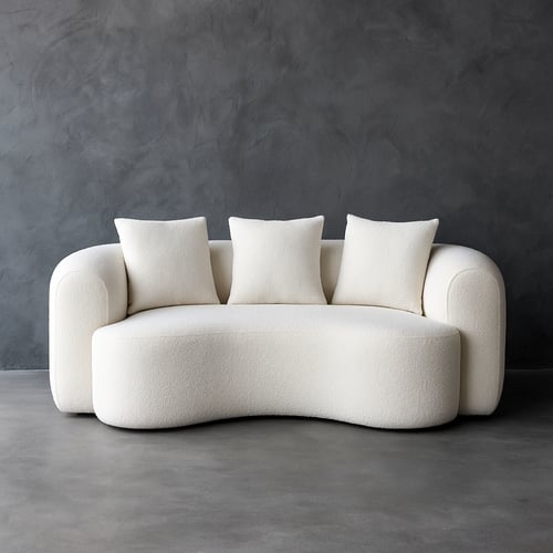 كنبة بتصميم عصري باللون الأبيض