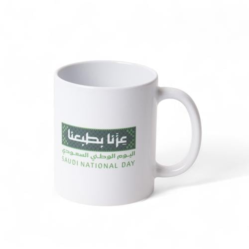 كاسة بعبارة عِزنا بطبعنا يوم وطني - 2 قطعة